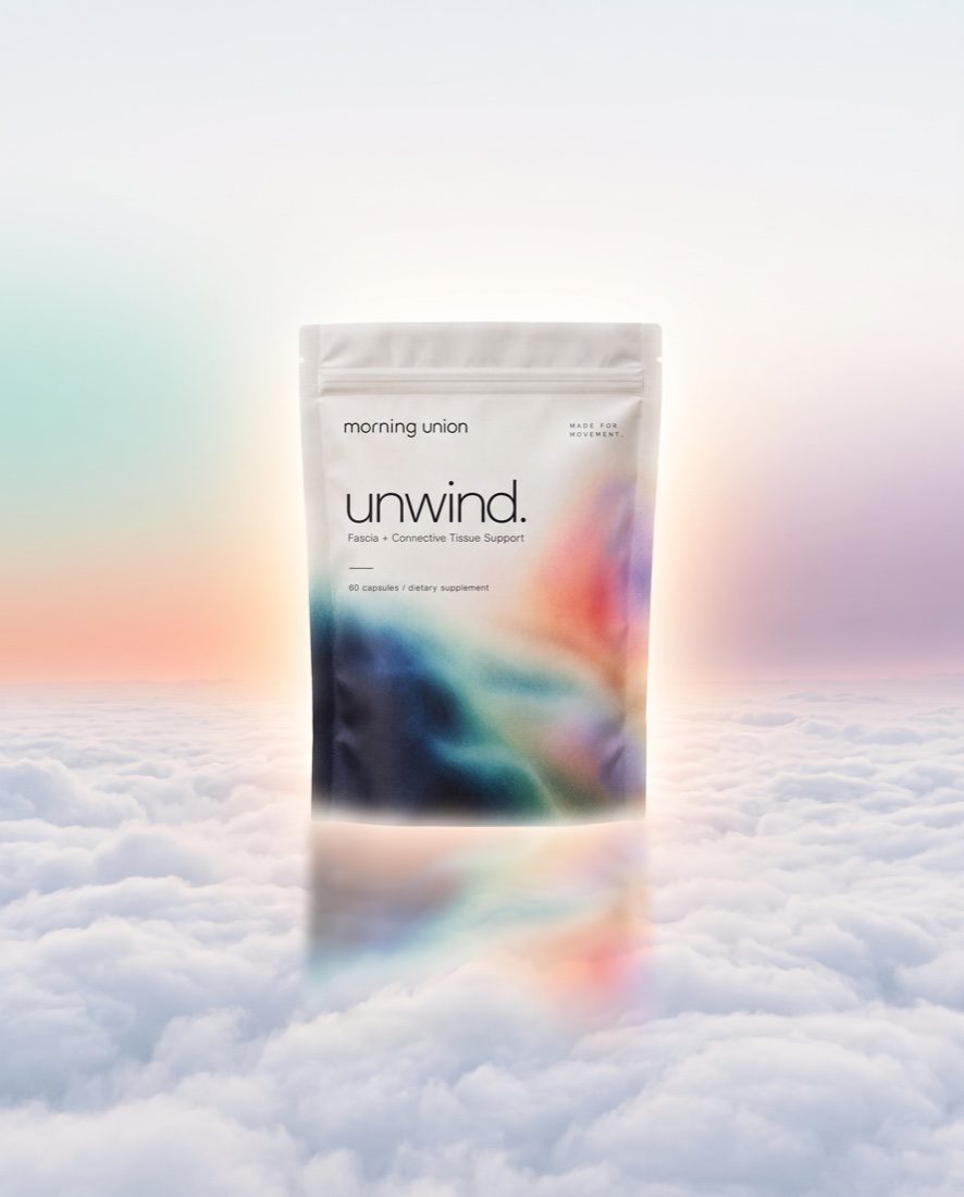 unwind. pouch floating above clouds at sunrise